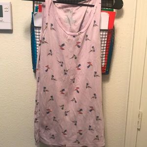 This is a shirt from the brand Time and Tru. The size is a L (12-14).